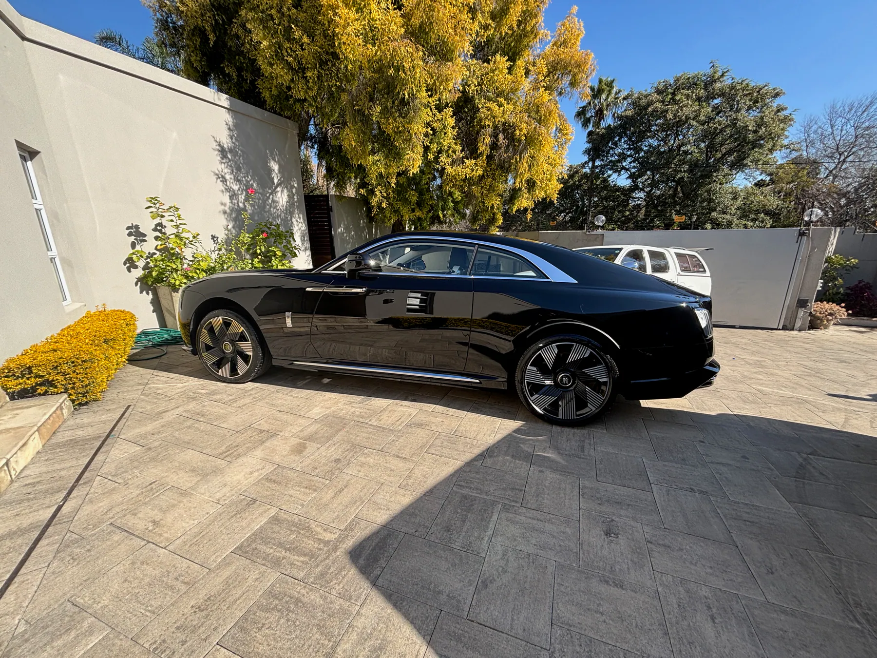 Black Rolls-Royce after luxury detailing